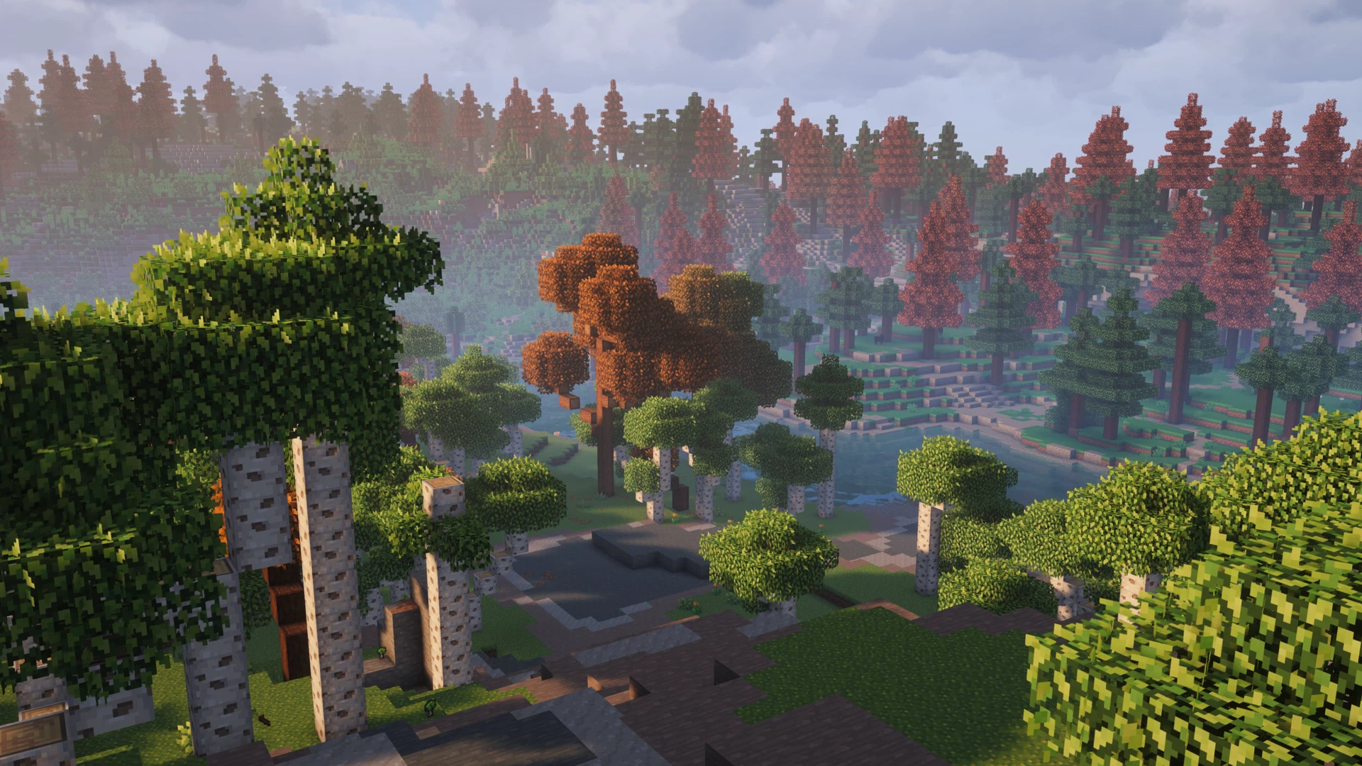 A verdant meadow biome sprinkled with flowers, in which cows graze peacefully. In the background stands a hill covered with a spruce forest. The weather is clear, with a few clouds.